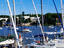 Yacht harbour (Puerta de Yates) with twin towers of Basilica de Santsimo Sacramento in background..