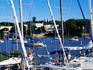Yacht harbour (Puerta de Yates) with twin towers of Basilica de Santsimo Sacramento in background..