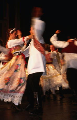 Dalmatian people dancing at folk performance.