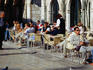 People sitting at outdoor cafe on Placa.