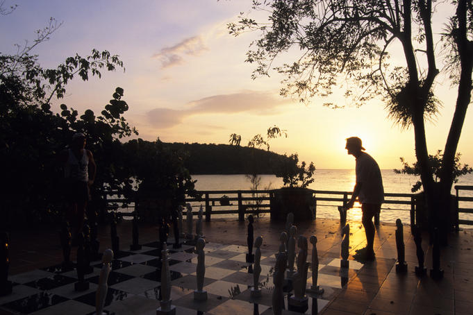 Playing Floor Chess at Sunset at Grand Lido Sans Souci Resort.