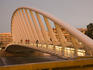 People walking on Puente de Calatrava (Calatrava Bridge).