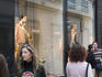 People shopping, exterior of boutique on Calle Poetica.