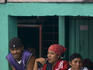 Passengers waiting for boat at terminal.