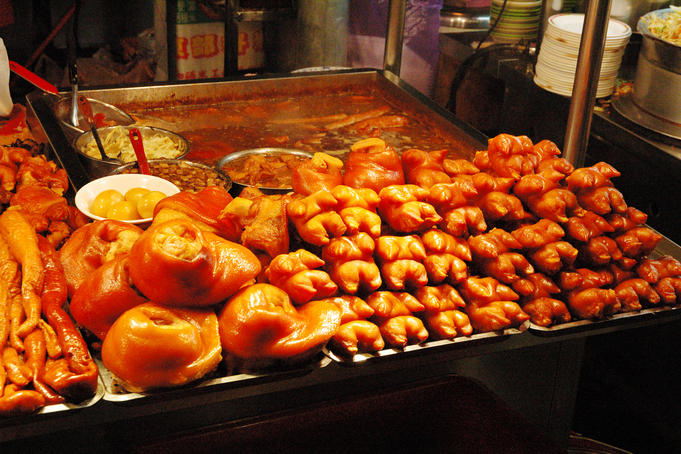 Pigs trotters on sale at Snake Alley Night Market.
