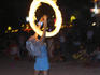 Fire spinning at full moon party.