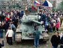 People around Russian T-34 tank during 50th anniversary of Liberation.
