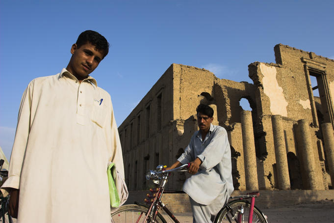 Local men outside Seraj-ul-Emorat (Light of Buildings) Palace.