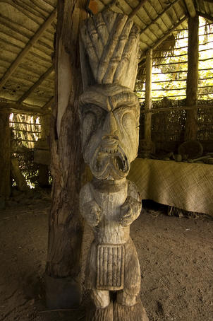 Kamokila Hawaiian Village, carved effigy in house.