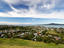 Overhead of Devonport, Cheltenham beach and Rangitoto island, Hauraki Gulf, from Mt Victoria.