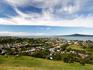 Overhead of Devonport, Cheltenham beach and Rangitoto island, Hauraki Gulf, from Mt Victoria.