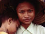 Portrait of Khmer Krom ethnic Khmer woman from Mekong Delta with her child.