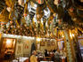 Spanish ham legs mature on ceiling of Pallacio de la Bellota, Centro Historico.