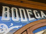 Door sign of Bodega Montana, Port area.