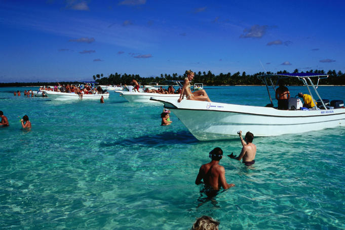 Tourists enjoying sun and sea near Punta Cana.
