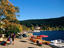 People outdoors, relaxing by river Black Forest.
