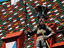 Detail of vivid red Rathaus (town hall) facade, with statue carrying Basel's coat of arms and rival Z