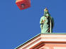 Franciscan Church of Annunciation with hot-air balloon in distance.