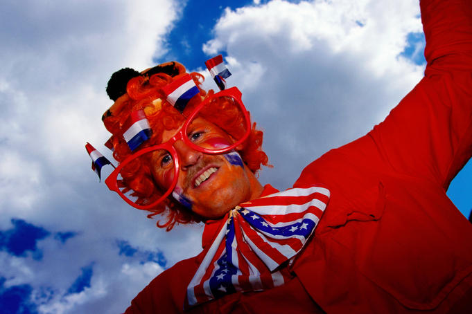 Supporter of Dutch national football team in costume.