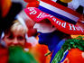 Supporters of Dutch national football team in costume.