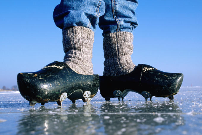 Ice sailor wearing traditional clogs with hobnails.