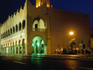 The Palacio Municipal glows at dusk, on west side of Zocalo, built in 1542.