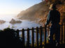 Man standing on observation deck looking at coastline, Pfeiffer Burns State Park.