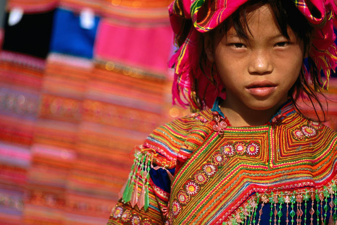 Ethnic Flowery H'mong girl at weekly market in Vietnam's far north, Ban Lo.