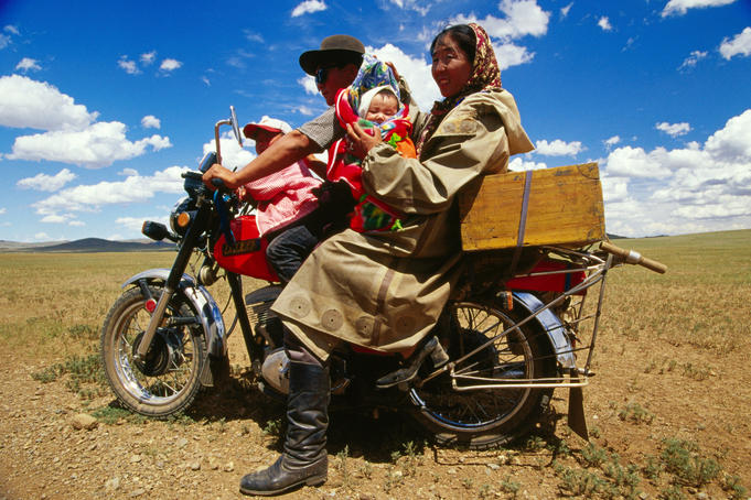 Family transport, family on motorbike.