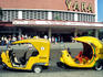 Coco taxis outside the cinema in Vedado.