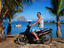 Girl on scooter, Rarotonga & the Cook Islands