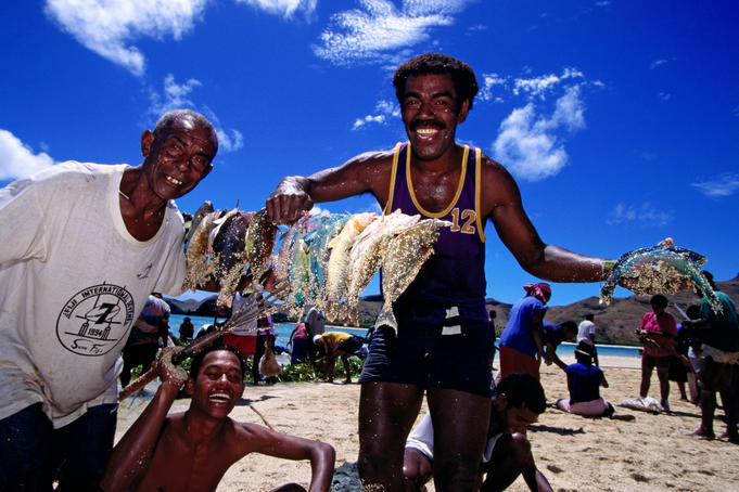 Man happy with their catch of the day.