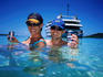 Couple enjoying beer in lagoon, Blue Lagoon cruise, Nanuya Lailai Island.