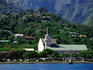 Protestant church and Papeete hillside houses.