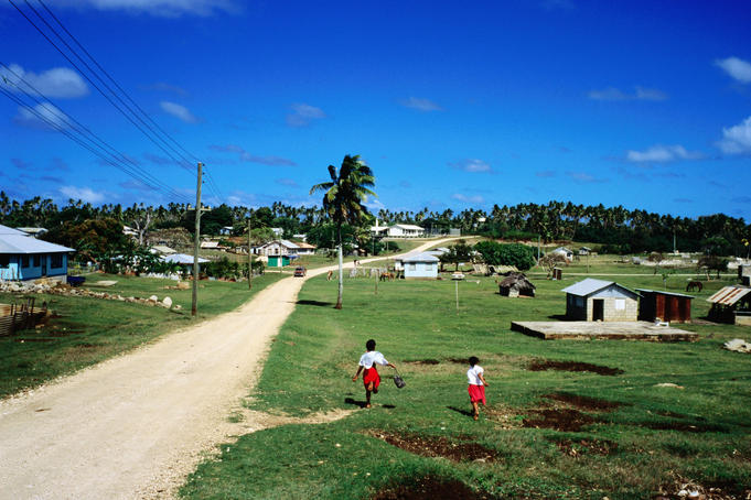 Children running through the town.