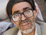 Yemenite man with thick glasses.