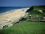 People taking the board walk to the Cape Cod National Seashore, the Atlantic ocean dunes - Cape Cod, Massachusetts