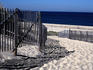 Fence across the sand dunes at Race Point Beach, part of the Cape Cod National Seashore, near Provincetown - Cape Cod, Massachusetts