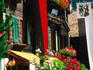 Wooden chalet with Swiss National Day banners, Beatenberg.