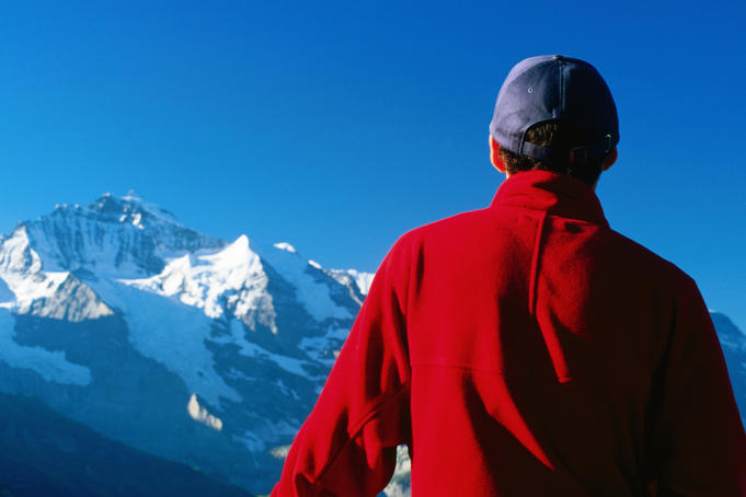 Man looking towards Jungfrau, Schynige Platte.
