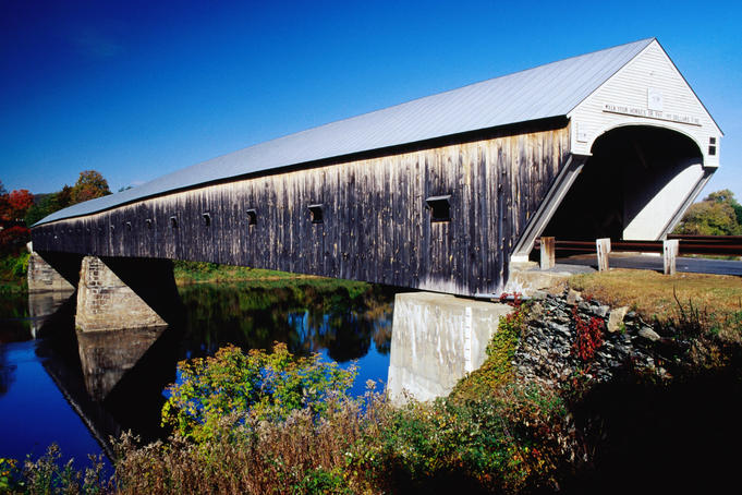 Cornish covered bridge over river.