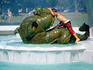 Boy climbing on Trevor M. Days Memorial Fountain, Mission Bay Park.