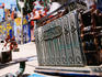 Children playing near old cash register in street, Callejon Hamel.
