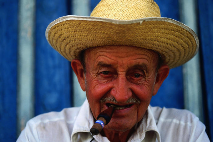 Man smoking cigar.