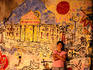 Boy standing against mural.