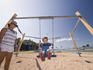 Rock Pool has playground with swings for kids.