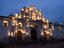 Facade of Cathedral de Santiago lit up at night.