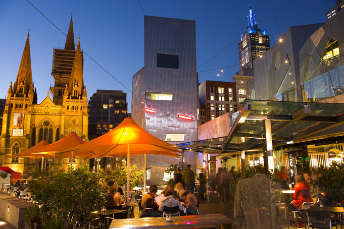 Federation Square with skyline in background.