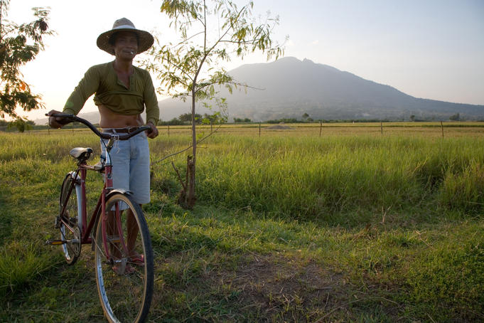 Farmer with Mt. Arayat in the back, Arayat, Pampanga, Luzon Island, Philippines