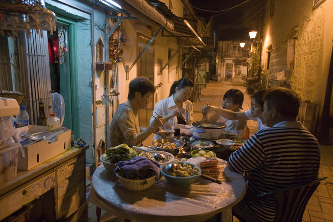Family dining outside in Old Taipa.